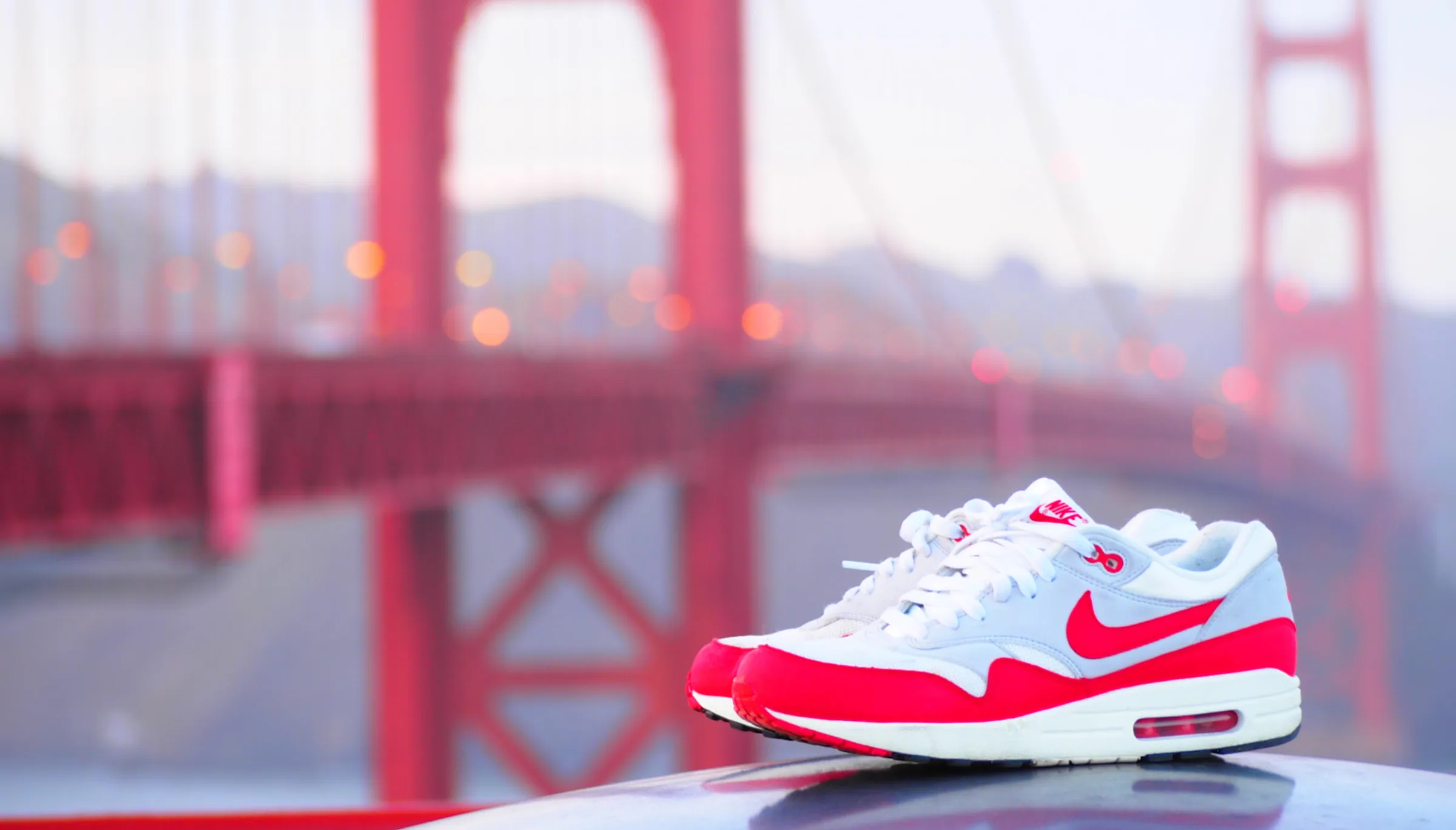 Nike Air Max 1 OG sneaker with the Golden Gate Bridge behind, San Francisco