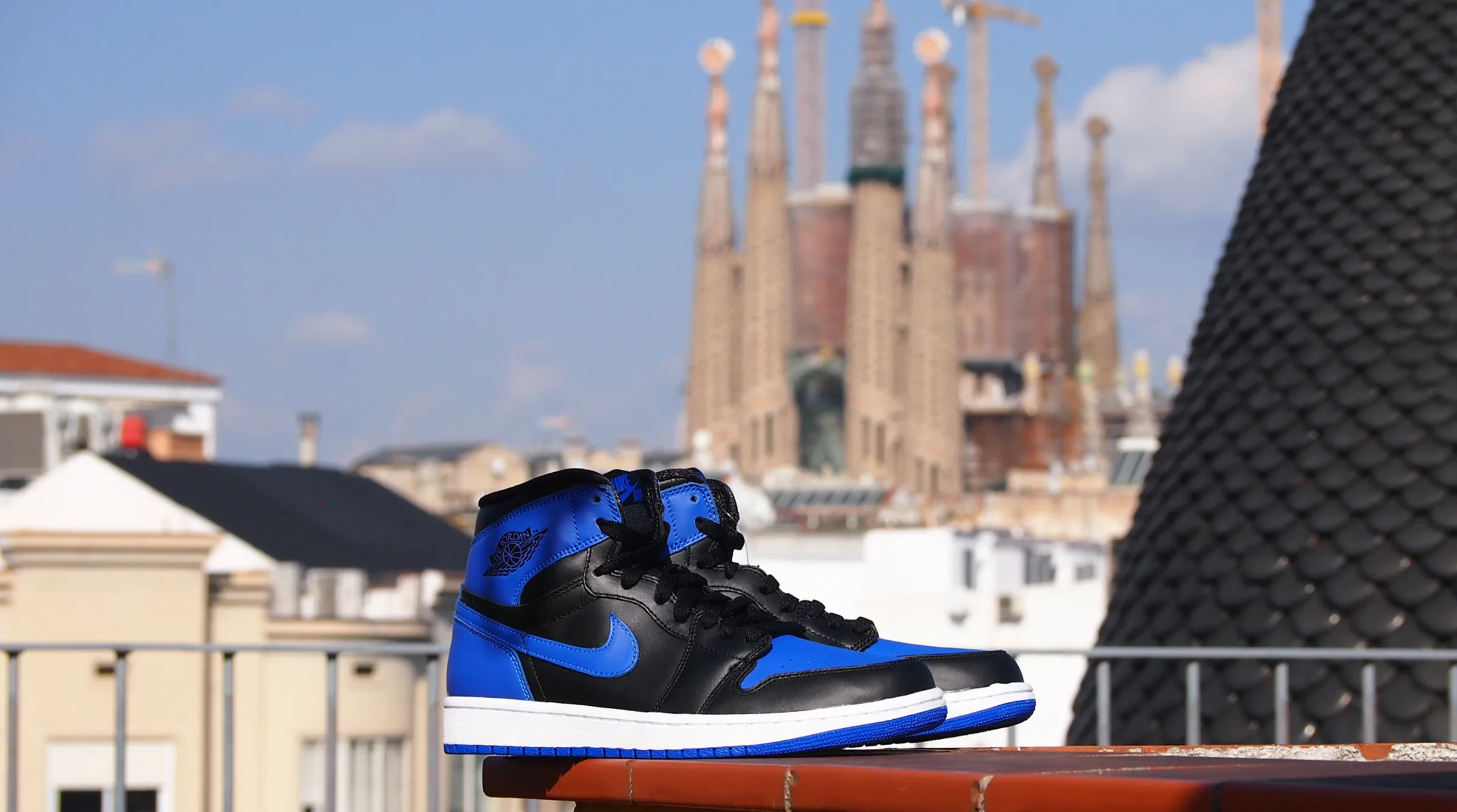 Air Jordan 1 Royal sneakers in front of the Sagrada Família, Barcelona
